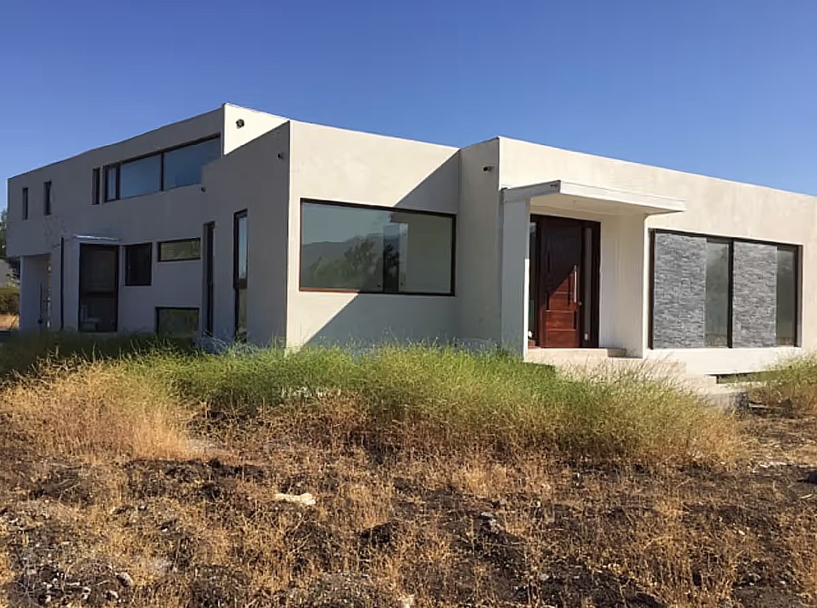 Construcción de casa nueva en Santiago por ArqSol Construcciones
